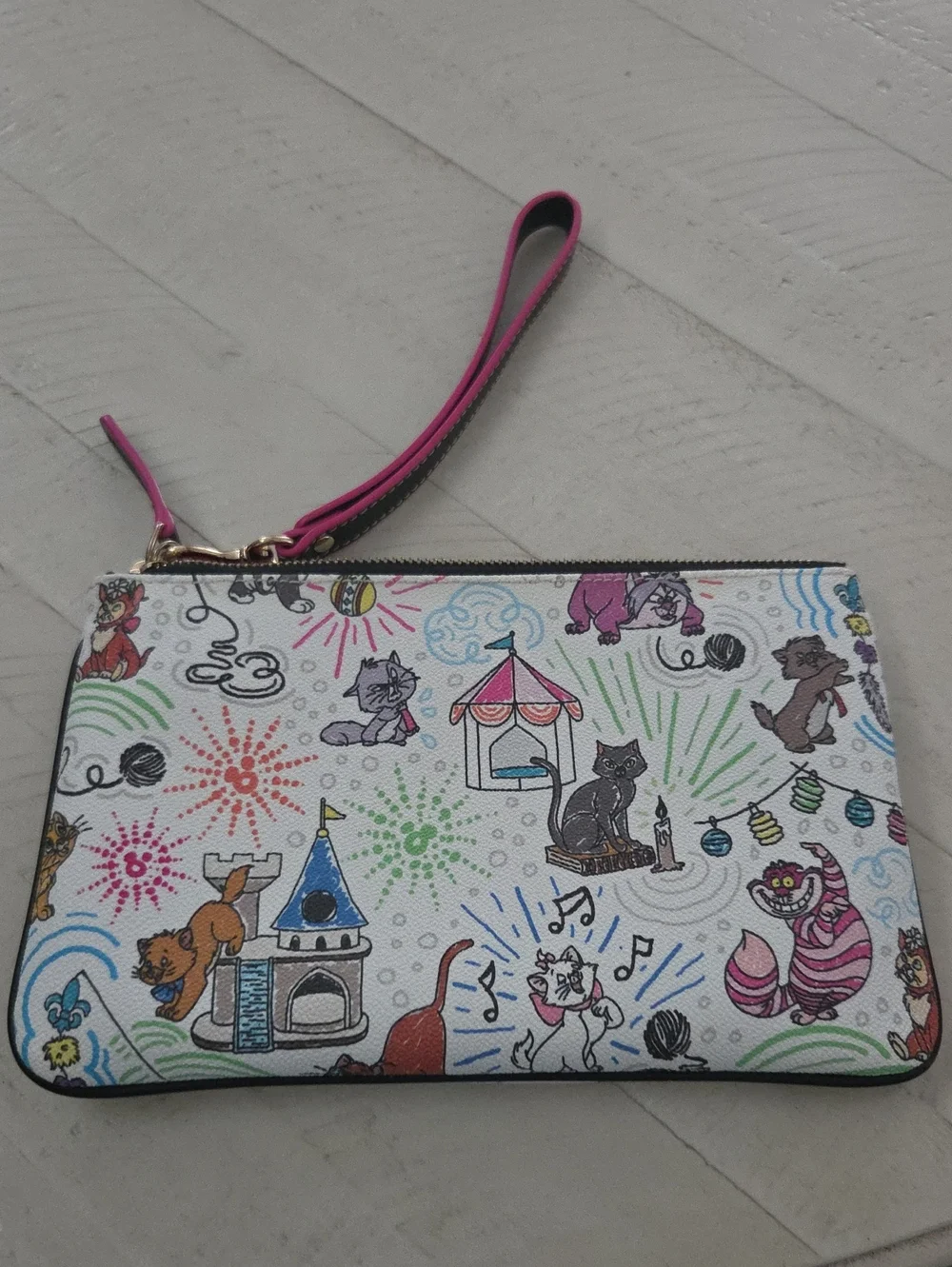 Dooney & Bourke White Cat-Print Wristlet with Pink Strap